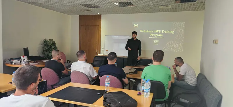 Elio presenting the Nebulane AWS Training Program to a room of Lebanese University students.